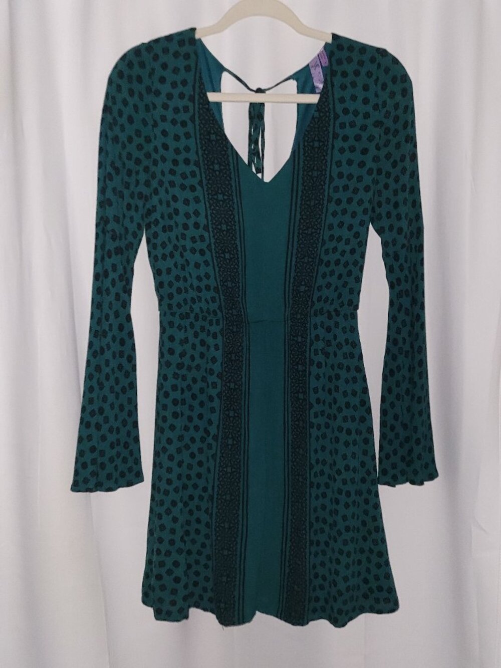 Alya Francesca’s Emerald Green Boho Geometric Bell Sleeve Mini Dress